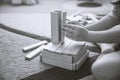 Child sits on carpet and play game, development toys, monochrome toning