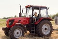 Child sitting in the cabin tractor