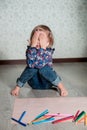 Child sitting on the floor Royalty Free Stock Photo