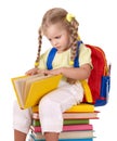 Child sitting on pile of books. Royalty Free Stock Photo