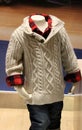 Child-sized mannequin dressed in Winter clothes that are fashionable for kids