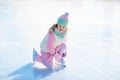 Child skating on natural ice. Kids with skates Royalty Free Stock Photo