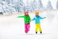Child skating on outdoor ice rink. Kids skate Royalty Free Stock Photo
