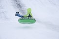 Child sledding cheesecake. Royalty Free Stock Photo