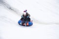 Kids are sleeping on toboggan Royalty Free Stock Photo