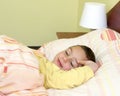 Child sleeping in bed Royalty Free Stock Photo