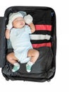 The child is sleeping in a suitcase on white background Royalty Free Stock Photo