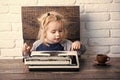 Child or small boy or businessman kid with typewriter Royalty Free Stock Photo