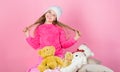 Child small girl playful hold teddy bear plush toy. Teddy bears improve psychological wellbeing. Unique attachments to