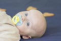 Child small l. with blue eyes three months Royalty Free Stock Photo