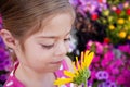 Child smelling Sunflower