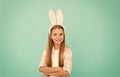 Child smiling play bunny role. Happy childhood. Traditions for kids to help get in easter spirit. Bunny ears accessory