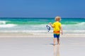 Child snorkeling on tropical beach. Kids snorkel Royalty Free Stock Photo