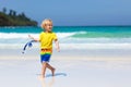 Child snorkeling on tropical beach. Kids snorkel Royalty Free Stock Photo