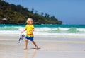 Child snorkeling on tropical beach. Kids snorkel Royalty Free Stock Photo