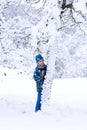 Child in snow in winter