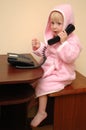 The child speaks on the phone