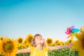 Child in spring field Royalty Free Stock Photo