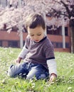 Child in spring park Royalty Free Stock Photo