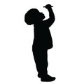 A child standing black color silhouette vector