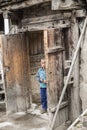A child standing in the door of Gansu.