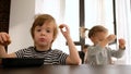 Child stared at the camera while having breakfast