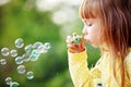 Child starting soap bubbles Royalty Free Stock Photo