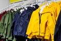 Child store jackets and hoodies hanging on rack