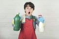 Child stressed with cleaning products