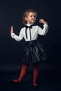 Child in the Studio posing in fashionable clothes