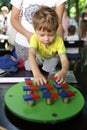 Child studying properties of magnet Royalty Free Stock Photo