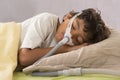 Child suffering from Sleep Apnea, wearing a respiratory mask Royalty Free Stock Photo