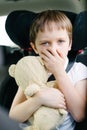 Child suffers from motion sickness in car Royalty Free Stock Photo