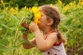 Child and sunflower