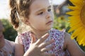 Child in sunflowers Royalty Free Stock Photo