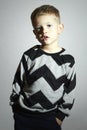 Child in sweater.children trend.little boy.emotion.fashionable kids Royalty Free Stock Photo
