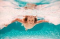 Child swim under water in sea. Kid swimming in pool underwater. Happy boy swims in sea underwater. Children in water Royalty Free Stock Photo