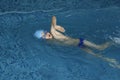 Child swimmer in swimming pool Royalty Free Stock Photo