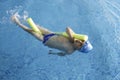 Child swimmer in swimming pool Royalty Free Stock Photo