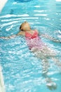 Child swimming backstroke Royalty Free Stock Photo
