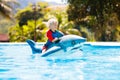 Child in swimming pool. Kid on inflatable float Royalty Free Stock Photo