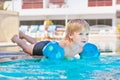 Child in the swimming-pool Royalty Free Stock Photo