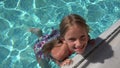 Child Swimming in Pool, Smiling Kid, Girl Portrait Enjoying Summer Vacation