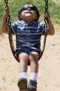 Child Swinging Royalty Free Stock Photo