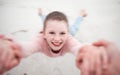 Child swinging from hands at beach, pov and happy, smile and laugh. Fun time, motion or girl in garden spinning from Royalty Free Stock Photo