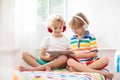 Child with tablet computer. Kids study online. Royalty Free Stock Photo