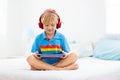 Child with tablet computer. Kids study online Royalty Free Stock Photo