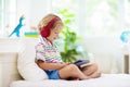 Child with tablet computer. Kids study online Royalty Free Stock Photo