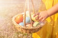 A child takes out an Easter egg from a basket Royalty Free Stock Photo