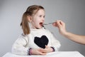 Child taking medication Royalty Free Stock Photo